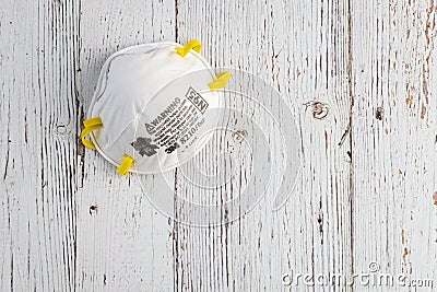 BELLEVUE, WA/USA â€“ APRIL 30, 2020: PPE on a rustic white background, 3M N95 mask Editorial Stock Photo